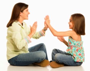 Mother and daughter playing.